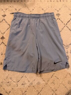 Nike Men's Sky Blue Athletic Shorts with Black Swoosh